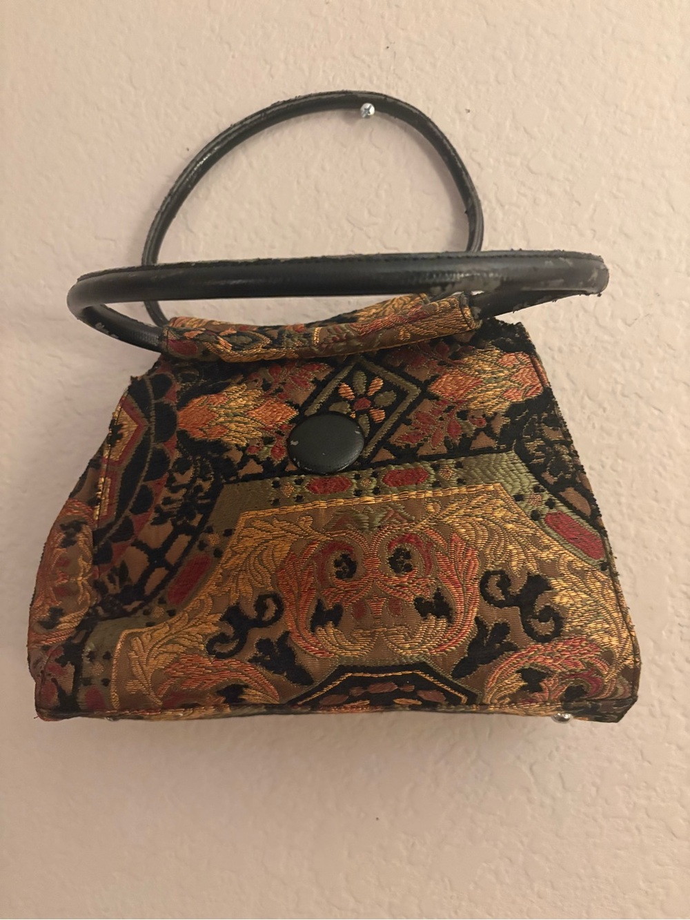 Used vintage tapestry bag with worn handles unique from Soapbox